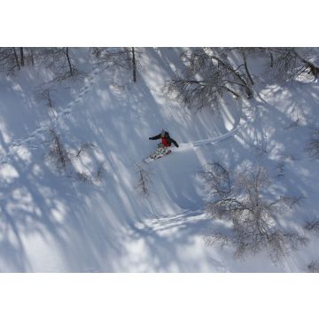 Lais Puzzle - Snowboarder fährt im Skigebiet in Nevados De Chilean, Chile in den Anden, durch das schneebedeckte Gebirgsgelände - 100, 200, 500 & 1.000 Teile