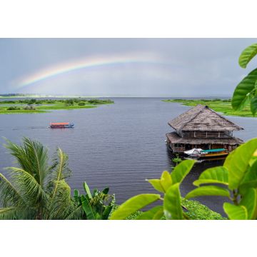 Lais Puzzle - Blick auf den Nebenfluss des Amazonas in Iquitos, Peru. Ein Regenbogen über dem Fluss und ein wunderschönes Gebäude, das auf dem Wasser schwimmt - 100, 200, 500 & 1.000 Teile