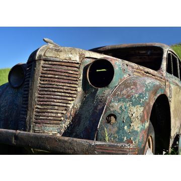 Lais Puzzle - Altes verrostetes Auto mit rostigem Lack ohne Fenster vor blauem Himmel - 100, 200, 500 & 1.000 Teile