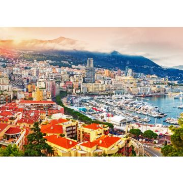 Lais Puzzle - Fürstentum Monaco. Malerischer Panoramablick auf Monaco bei Sonnenuntergang. Blick auf Wohngebäude, Casino, Hafen mit Luxusyachten. Monaco ist ein beliebtes Reiseziel für Glücksspiel - 100, 200, 500 & 1.000 Teile