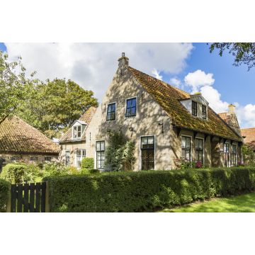 Lais Puzzle - Eines der schönen alten Häuschen (gebaut 1797) auf der Insel Ameland - 2.000 Teile