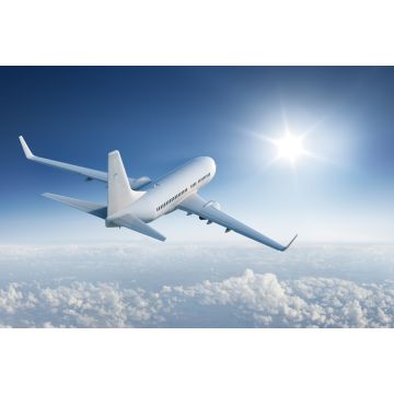 Lais Puzzle - Verkehrsflugzeug fliegt der Sonne am blauen Himmel entgegen - 2.000 Teile