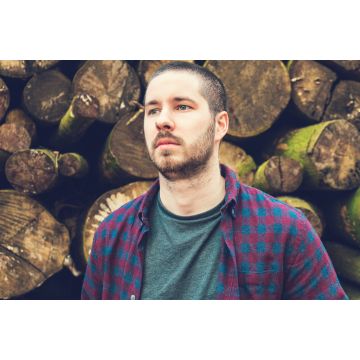 Lais Puzzle - Mann mit Baumstämmen - 2.000 Teile
