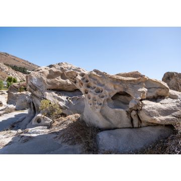 Lais Puzzle - Granitgraue Felsen, geformt durch das Meersalz und den Wind im Hintergrund. Kolymbithres Paros Insel Griechenland - 1.000 Teile
