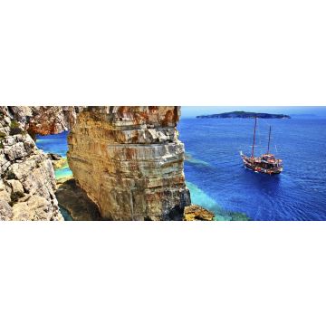 Lais Puzzle - Touristenboot auf dem Weg zum Trypitos (auch bekannt als "Kamara"), einem natürlichen Felsbogen auf der Insel Paxos, Ionisches Meer, Griechenland. Im Hintergrund die Insel Antipaxos, Panorama - 1.000 Teile