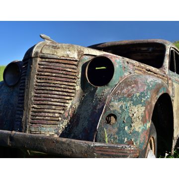 Lais Puzzle - Altes verrostetes Auto mit rostigem Lack ohne Fenster vor blauem Himmel - 1.000 Teile