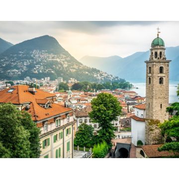 Lais Puzzle - Stadtbild von Lugano mit Glockenturm der Kathedrale St. Lorenz und Blick auf den See und dramatisches Licht in Lugano Schweiz - 1.000 Teile