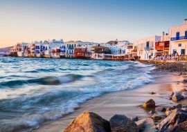 Lais Puzzle - Rauschende Wellen und ein Abendessen bei Sonnenuntergang im märchenhaften Mykonos-Viertel Klein-Venedig, Mykonos, Griechenland - 100, 200, 500 & 1.000 Teile