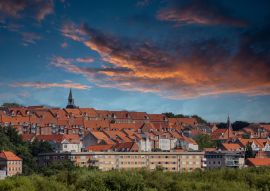 Lais Puzzle - Bunte Wolken über rotem Dach in Randers Stadt Dänemark - 100, 200, 500 & 1.000 Teile