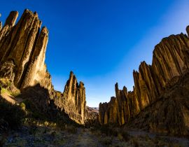 Lais Puzzle - Sonnenuntergang mit Rocky Mountains und einigen Spitzen im "Valle de Las Animas" (Tal der Animas) in La Paz / Bolivien - 40, 100, 200, 500, 1.000 & 2.000 Teile