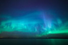Lais Puzzle - Nordlichter über einem See in Finnland - 2.000 Teile