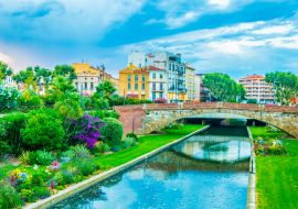 Lais Puzzle - Blick bei Sonnenuntergang auf den Fluss La Bassa, der durch das Stadtzentrum von Perpignan fließt, Frankreich - 1.000 Teile