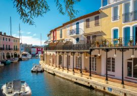 Lais Puzzle - Bunte Häuser und Boote auf einem Kanal in Port Grimaud, an der französischen Riviera - 1.000 Teile