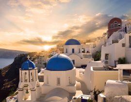 Lais Puzzle - Traditionelle weiße Architektur in Oia auf Santorin, beleuchtet von einem wunderschönen Sonnenuntergang in Griechenland - Europa - 40, 100, 200, 500, 1.000 & 2.000 Teile