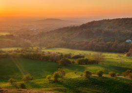 Lais Puzzle - Warmer orangefarbener Sonnenuntergang über dem Gloucester Valley in England - 1.000 Teile