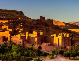 Lais Puzzle - Sonnenuntergang in Aït Benhaddou. Es ist ein befestigtes Dorf entlang der ehemaligen Karawanenroute zwischen der Sahara und Marrakesch, Marokko - 40, 100, 200, 500, 1.000 & 2.000 Teile