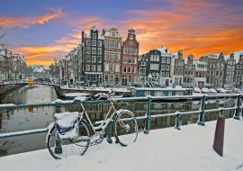 Lais Puzzle - Stadtansichten von Amsterdam im Winter in den Niederlanden bei Sonnenuntergang - 1.000 Teile