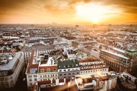 Lais Puzzle - Wiens Skyline bei Sonnenuntergang von der Spitze des Stephansdoms aus gesehen - 2.000 Teile