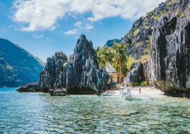 Lais Puzzle - El Nido Palawan Philippinen Asien. Banca-Boot an einem kleinen Strand in der Nähe des Matinloc-Schreins - 1.000 Teile