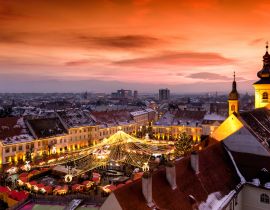 Lais Puzzle - Weihnachtsmarkt in Sibiu, Siebenbürgen, Rumänien. Wunderschöner Sonnenuntergang im Herzen von Siebenbürgen. Stadt auch bekannt als Hermannstadt - 40, 100, 200, 500, 1.000 & 2.000 Teile