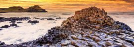 Lais Puzzle - Blick auf den Sonnenuntergang am Giants Causeway in Nordirland, Panorama - 1.000 Teile