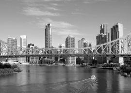 Lais Puzzle - Story Bridge in Brisbane mit Fluss und Fährengebäuden im Hintergrund in schwarz weiß - 500 & 1.000 Teile