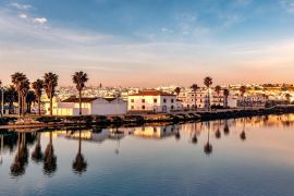 Lais Puzzle - Panoramablick auf Conil de la Frontera in Südspanien bei Sonnenuntergang - 2.000 Teile