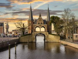Lais Puzzle - Der Waterpoort in Sneek (Friesland, Niederlande) während eines schönen Sonnenuntergangs/Sonnenaufgangs - 1.000 Teile