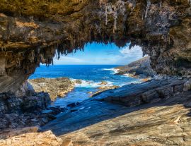 Lais Puzzle - Admirals Arch. Berühmter "Admirals Arch" im Flinders Chase National Park, Kangaroo Island, Australien. Erstaunliche Felsformation, Robben im Hintergrund - 1.000 Teile
