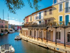 Lais Puzzle - Bunte Häuser und Boote auf einem Kanal in Port Grimaud, an der französischen Riviera - 1.000 Teile
