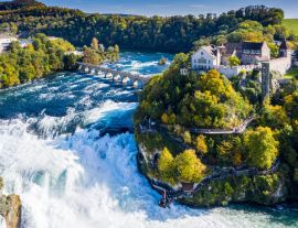 Lais Puzzle - Rheinfall, Schweiz Panoramablick aus der Vogelperspektive. Touristenboot im Wasserfall. Brücke und Grenze zwischen den Kantonen Schaffhausen und Zürich. Felsenschloss Laufen, Laufen-Uhwiesen - 1.000 Teile